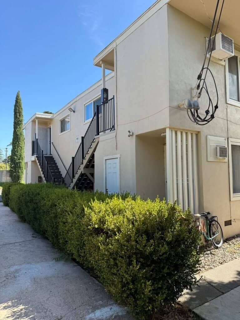 Repeated exterior stair runs at an Elk Grove apartment community after composite tread replacement