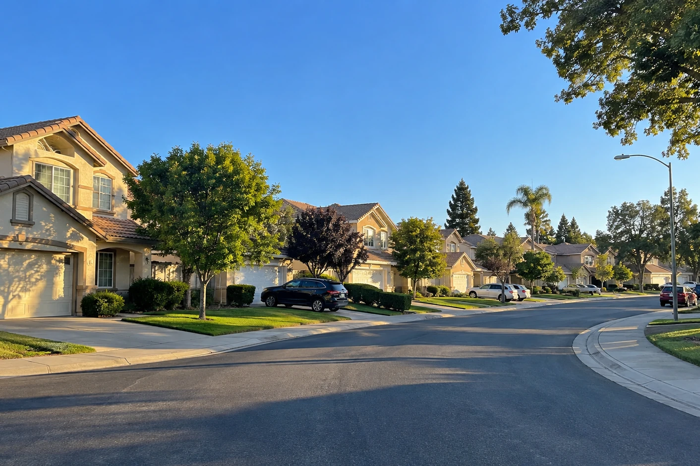 Antelope, California residential street of late-1980s and 1990s tract homes with mature street trees