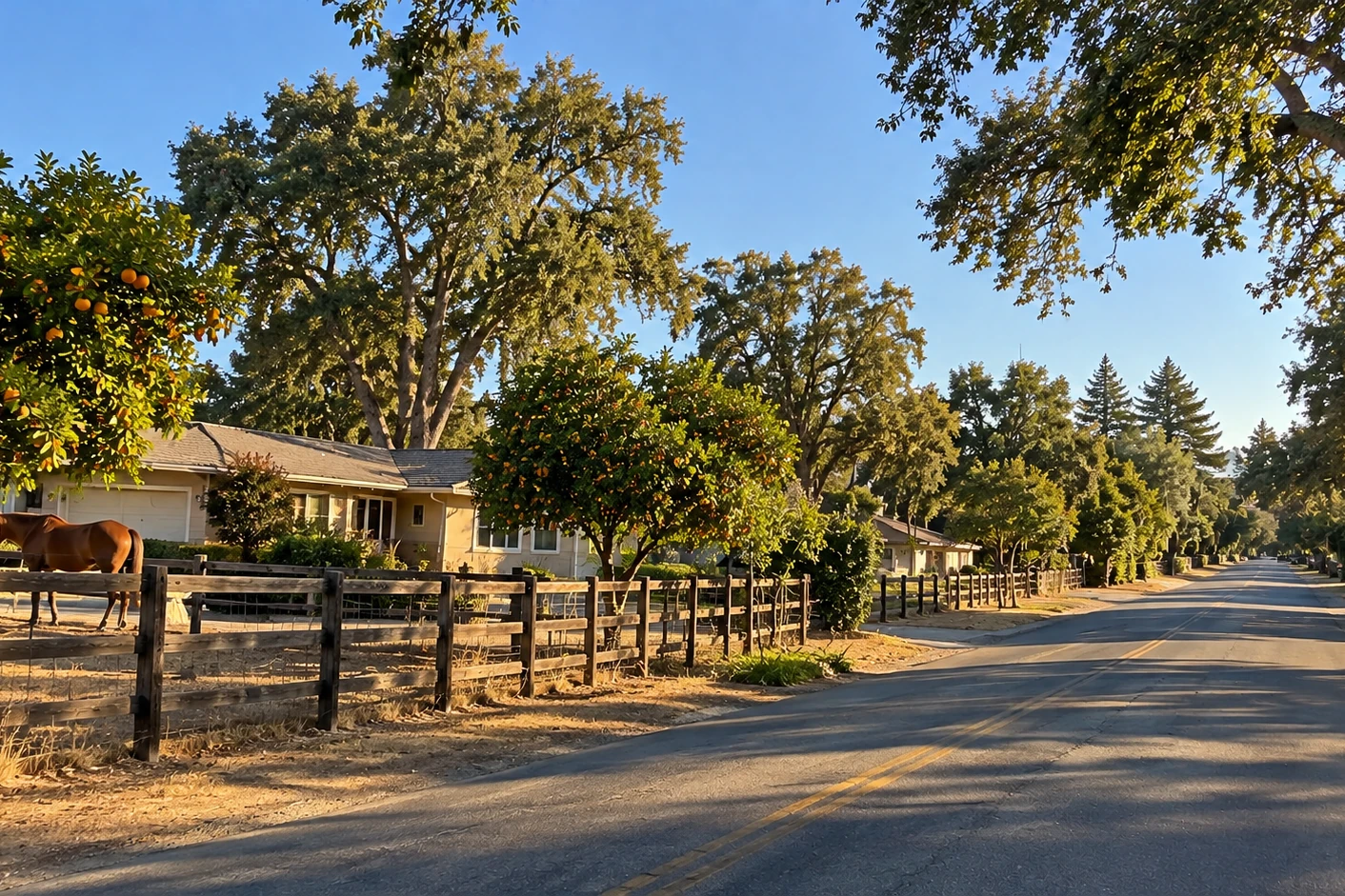 Semi-rural Orangevale, California street with split-rail fencing