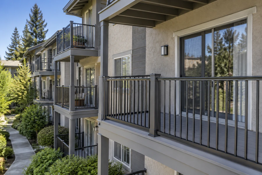Balconies restored across a community, with refinished soffits and new guardrails