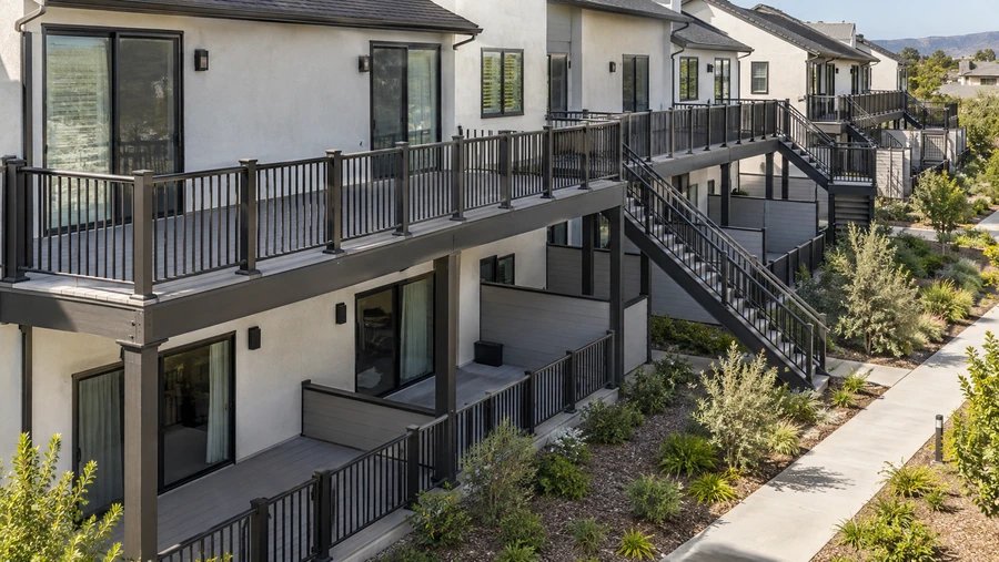 Completed composite decks, stairs and balconies serving upper and lower units
