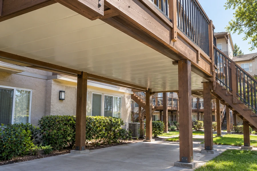 Timber decks and stairs along a courtyard elevation with enclosed undersides